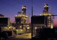 Dominion Energy power station at sunset, symbolizing energy transformation