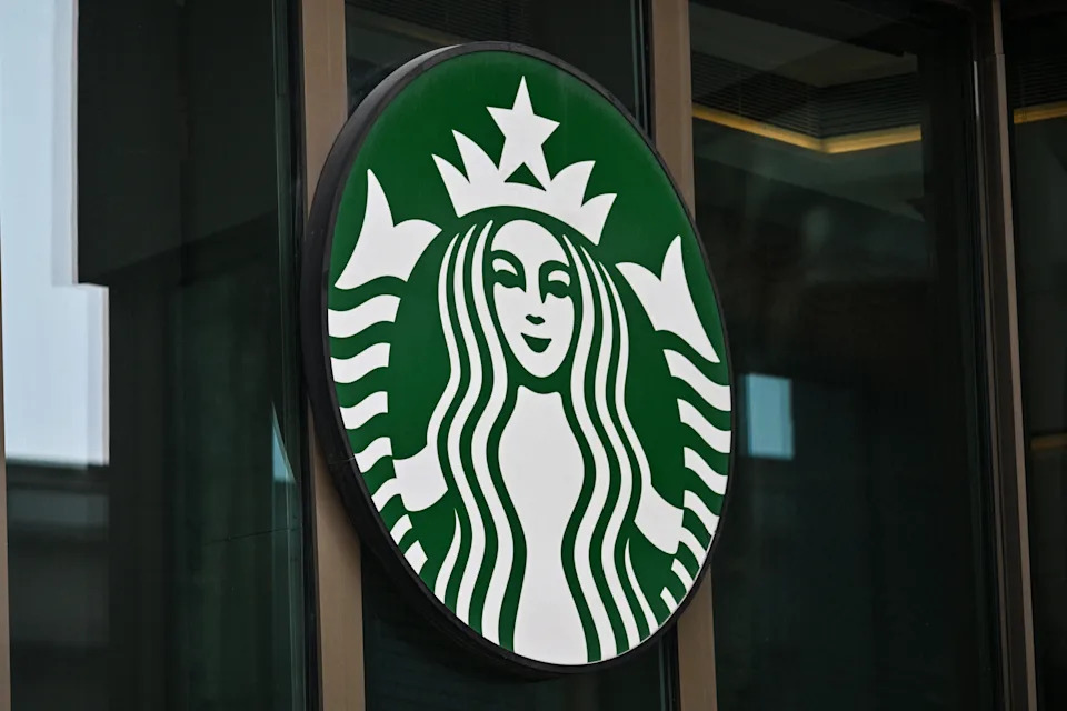 Starbucks SBUX store exterior during a busy day