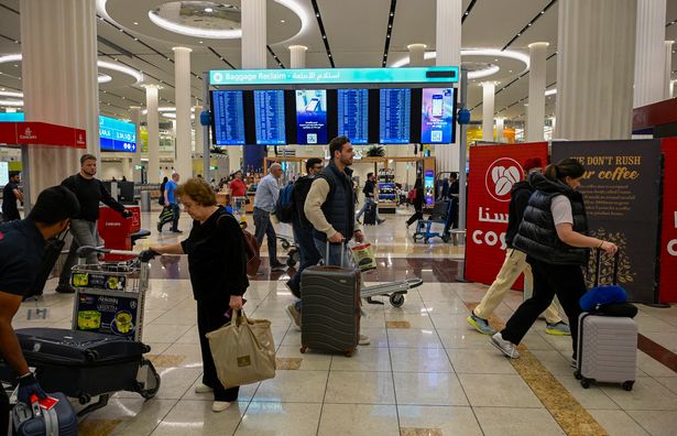 Aerial view of Dubai International Airport and runway