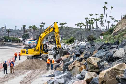 San Clemente rail repair crews working along the coastline