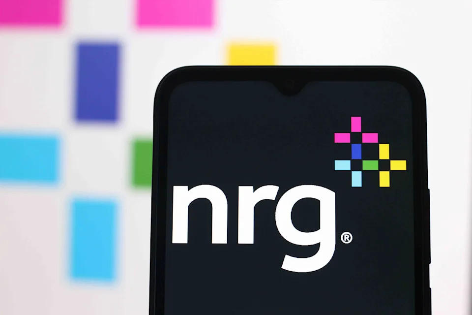 Traders watching NRG stock performance on trading platform
